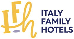 Logo colorato di un'accogliente catena di hotel per famiglie in Italia.