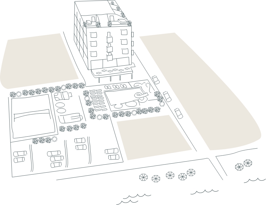 Complesso con piscina, parcheggio e accesso alla spiaggia, vicino a un edificio.